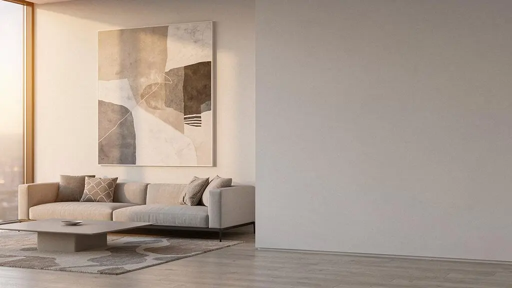 Salón contemporáneo con una gran obra de arte que estructura visualmente el espacio del hogar